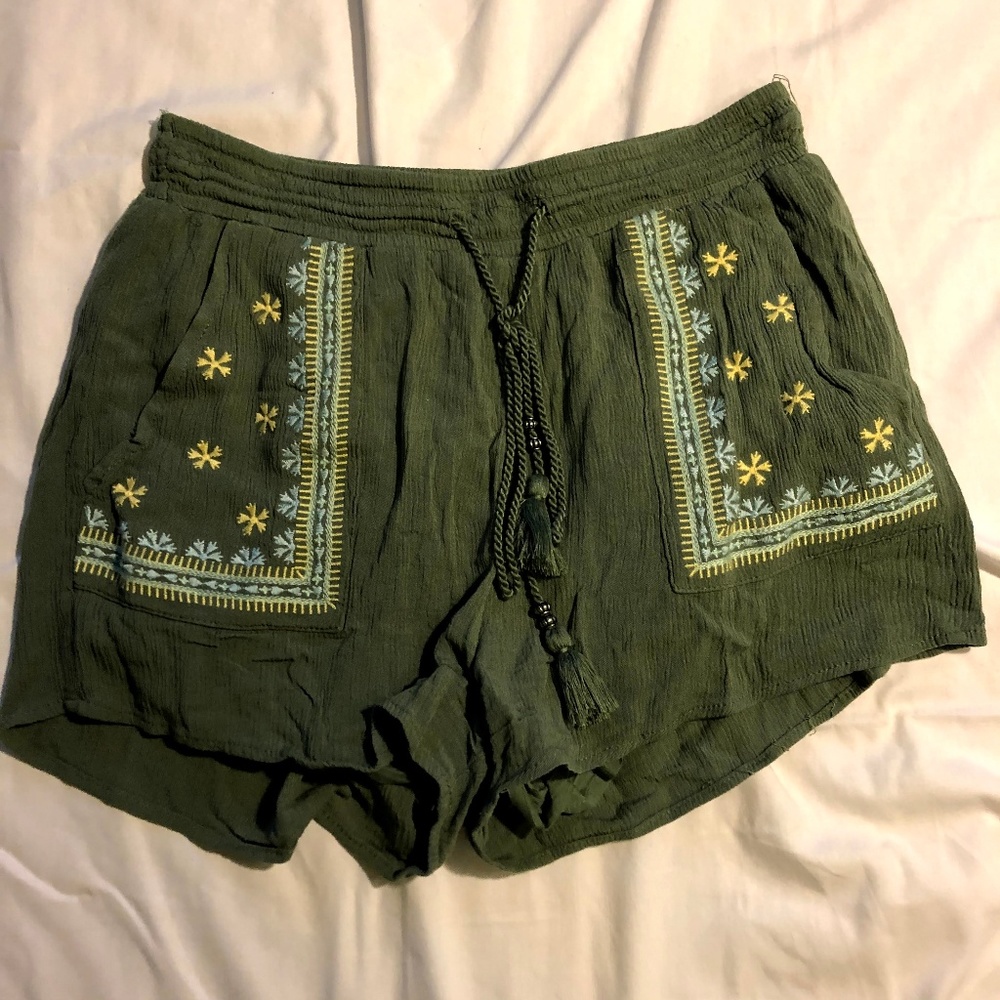 Green embroidered shorts